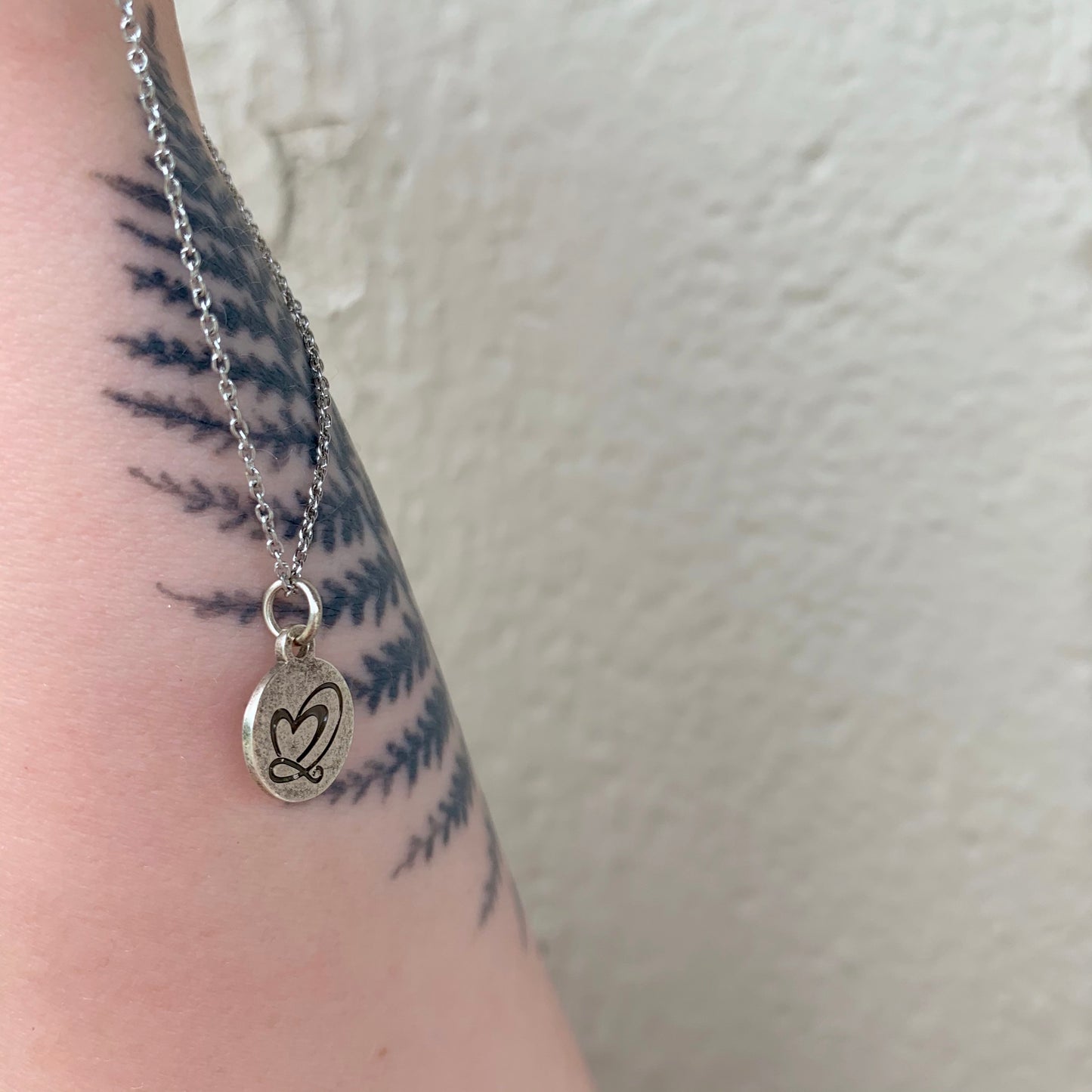 Laura Lotus Love Logo Pendant